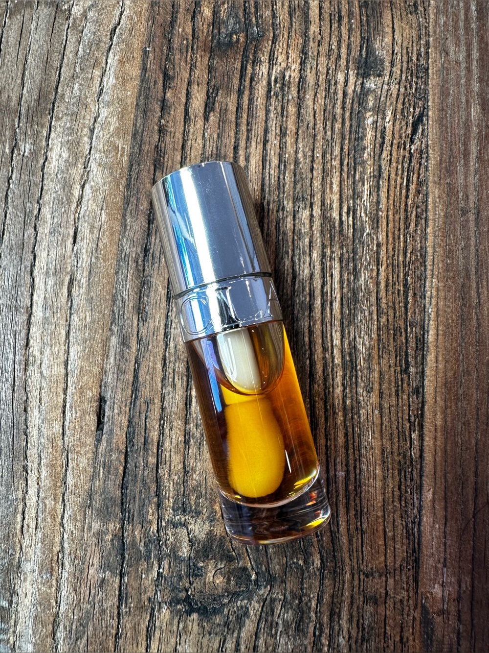 Clarins Lip Oil Gloss in Amber Gold with Silver Cap